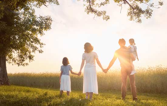 Family watching sunrise